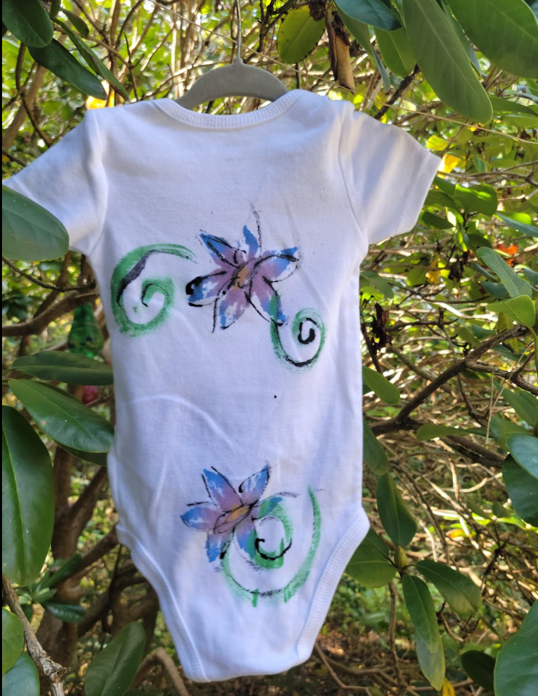 "Flower Splatter Power" Hand Painted Onesie