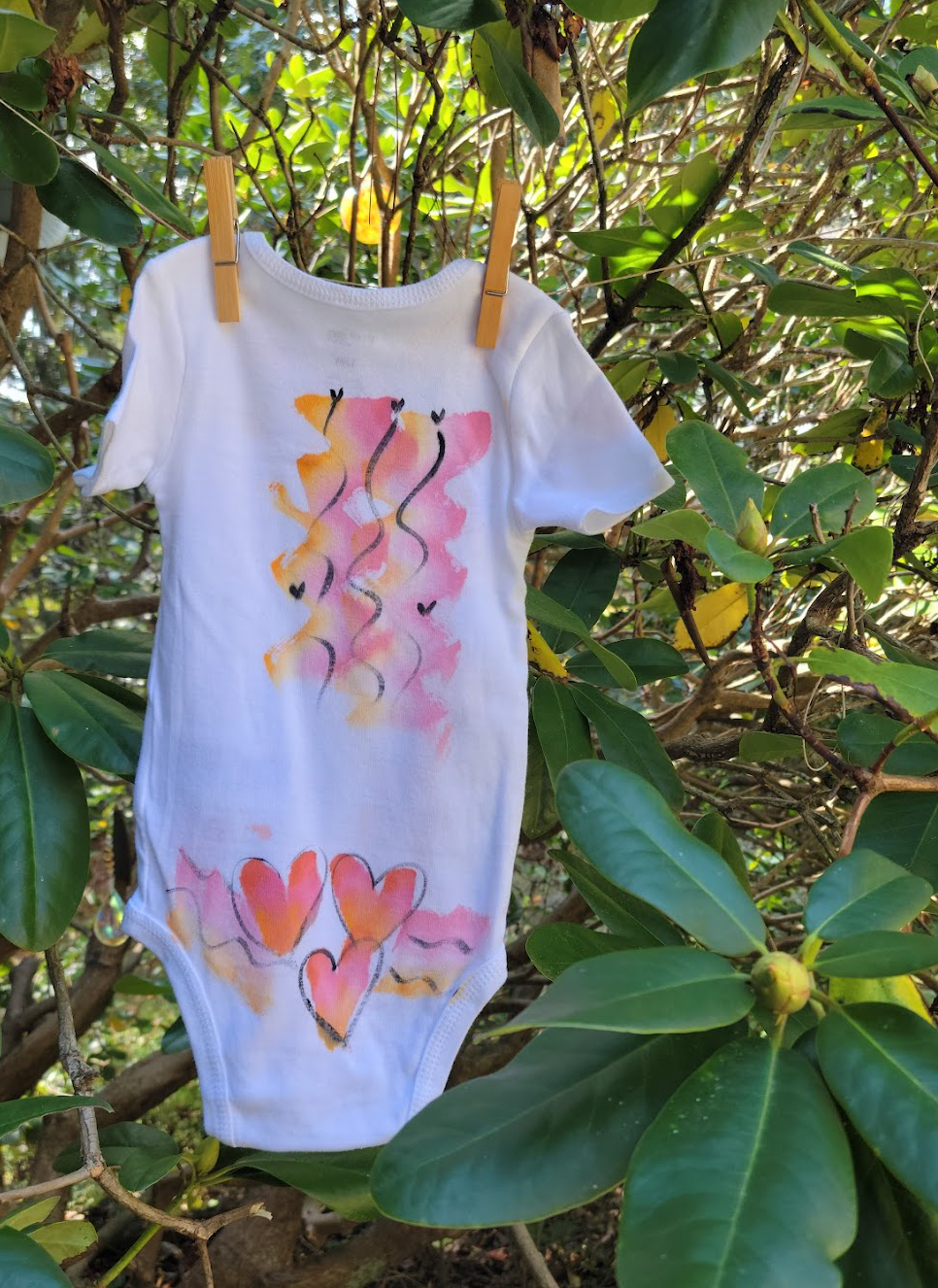 "Hearts a Flutter" Hand Painted Onesie